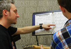 Jozef teaches guitar lessons